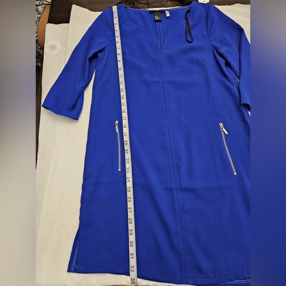 H&M Electric Blue Shift Dress
Size 6
In great condition
Measurements in picture - Picture 8 of 13
